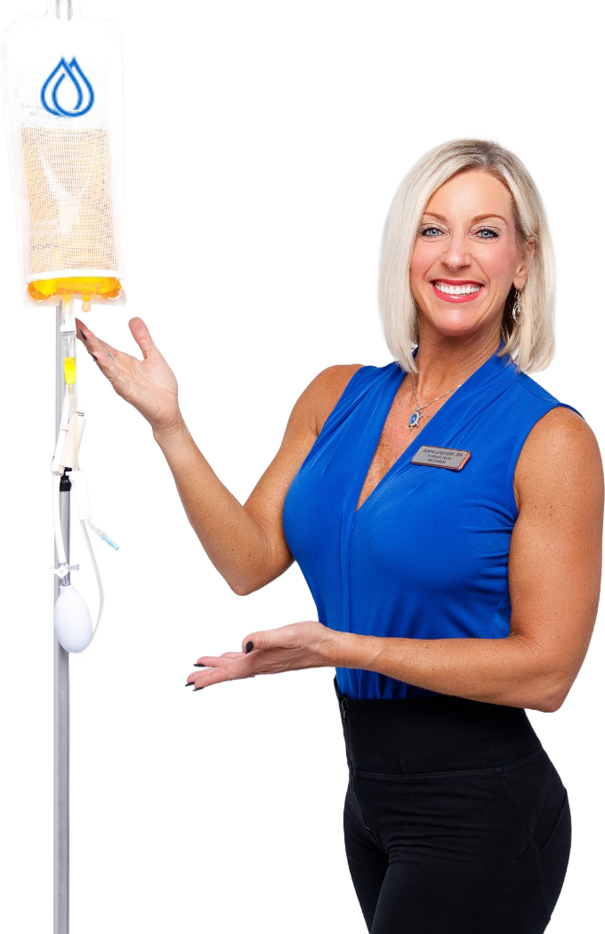 IV Wellness™ nurse holding a vitamin infusion bag during a mobile IV therapy visit.