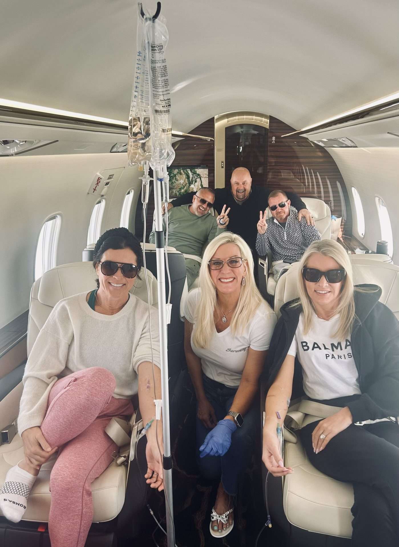 IV Wellness™ team members and happy clients during wellness events.